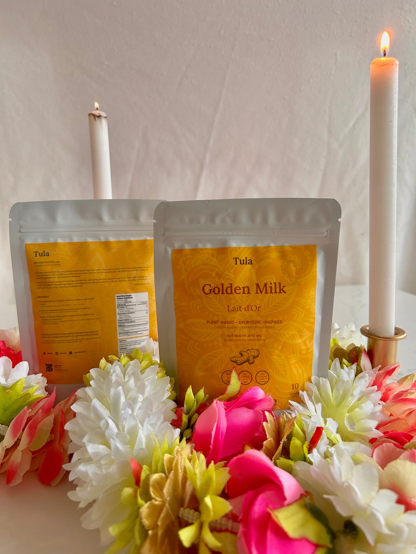 Golden milk fiber latte mix by Tula on a white backdrop (small packs)