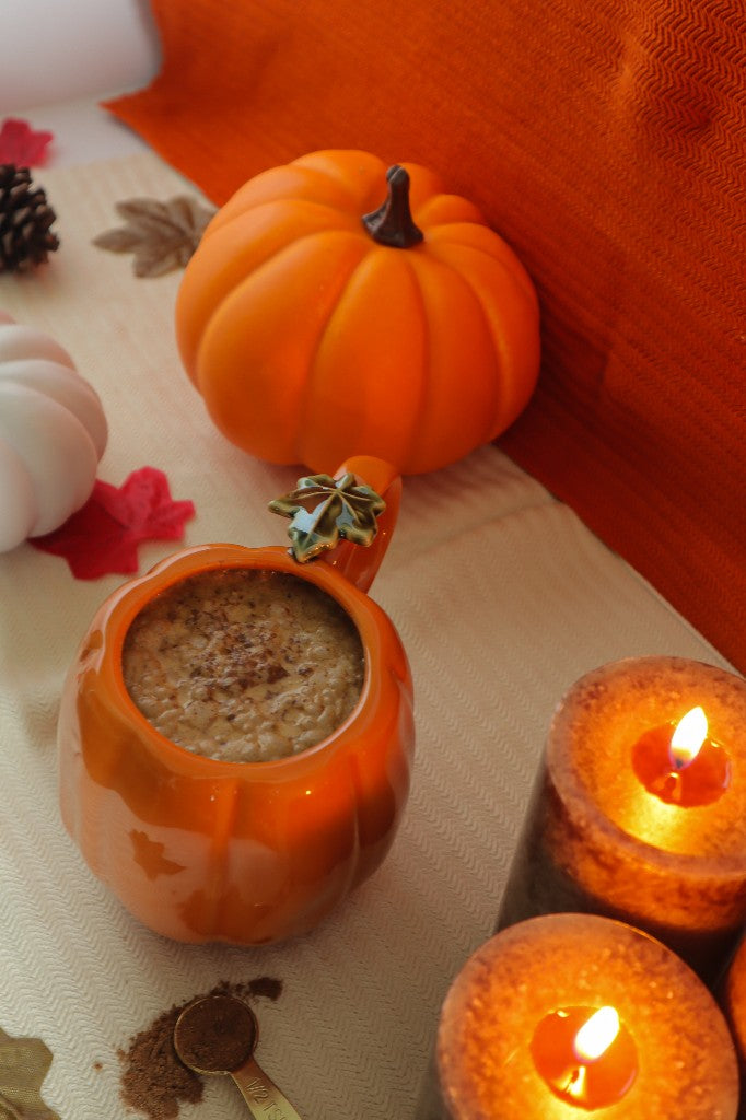 Pumpkin spice fiber latte by Tula in a pumpkin mug.